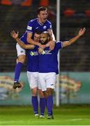 24 September 2021; Ethan Boyle of Finn Harps, right, celebrates with team-mates, Sean Boyd, left, and Ryan Rainey after scoring his side's first goal during the SSE Airtricity League Premier Division match between Bohemians and Finn Harps at Dalymount Park in Dublin. Photo by Piaras Ó Mídheach/Sportsfile