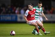 24 September 2021; Ronan Coughlan of St Patrick's Athletic in action against Aaron Greene of Shamrock Rovers during the SSE Airtricity League Premier Division match between St Patrick's Athletic and Shamrock Rovers at Richmond Park in Dublin. Photo by Seb Daly/Sportsfile