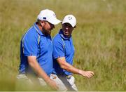 24 September 2021; Shane Lowry, left, and Rory McIlroy of Team Europe during their Friday afternoon fourballs match against Tony Finau and Harris English of Team USA at the Ryder Cup 2021 Matches at Whistling Straits in Kohler, Wisconsin, USA. Photo by Tom Russo/Sportsfile