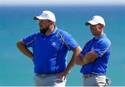 24 September 2021; Shane Lowry, left, and Rory McIlroy of Team Europe during their Friday afternoon fourballs match against Tony Finau and Harris English of Team USA at the Ryder Cup 2021 Matches at Whistling Straits in Kohler, Wisconsin, USA. Photo by Tom Russo/Sportsfile