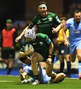 24 September 2021; Mack Hansen of Connacht gets away from Lloyd Williams of Cardiff Blues during the United Rugby Championship match between Cardiff Blues and Connacht at Arms Park in Cardifff, Wales. Photo by Ben Evans/Sportsfile