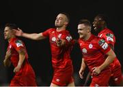 24 September 2021; Michael O'Connor of Shelbourne, second from left, celebrates after scoring his side's second goal with team-mates during the SSE Airtricity League First Division match between Cabinteely and Shelbourne at Stradbrook in Blackrock, Dublin. Photo by David Fitzgerald/Sportsfile