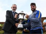 25 September 2021; Uachtarán Chumann Lúthchleas Gael Larry McCarthy, left, presents the Corn Setanta trophy to Colin Ryan of Limerick after the M. Donnelly GAA All-Ireland Poc Fada finals at Annaverna Mountain in the Cooley Peninsula, Ravensdale, Louth. Photo by Ben McShane/Sportsfile