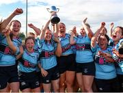 25 September 2021; MU Barnhall RFC J1 captain lifts the Paul Cusack cup as her team-mates celebrate after the Bank of Ireland Paul Cusack cup final match between Portlaoise RFC and MU Barnhall RFC J1 at Tullow RFC in Carlow. Photo by Michael P Ryan/Sportsfile