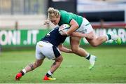25 September 2021; Cliodhna Moloney of Ireland is tackled by Lana Skeldon of Scotland during the Rugby World Cup 2022 Europe qualifying tournament match between Ireland and Scotland at Stadio Sergio Lanfranchi in Parma, Italy. Photo by Roberto Bregani/Sportsfile