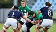 25 September 2021; Nichola Fryday of Ireland is tackled by Leah Bartlett and Rachel Malcolm of Scotland during the Rugby World Cup 2022 Europe qualifying tournament match between Ireland and Scotland at Stadio Sergio Lanfranchi in Parma, Italy. Photo by Roberto Bregani/Sportsfile