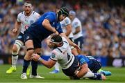 25 September 2021; Marcell Coetzee of Vodacom Bulls is tackled by Caelan Doris, left, and Rhys Ruddock of Leinster during the United Rugby Championship match between Leinster and Vodacom Bulls at Aviva Stadium in Dublin. Photo by Brendan Moran/Sportsfile