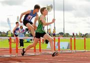 25 September 2021; Mark Hazlett from Lough Allen, Leitrim, on his way to winning the Boys under-14 hurdles during the Aldi Community Games Track and Field Athletics finals at Carlow IT Sports Campus in Carlow. Photo by Matt Browne/Sportsfile