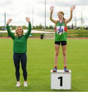 25 September 2021; Kate Brennan from Cong, Mayo, after she won the Girls under-14 Hurdles with Irish sprinter from Mayo Sarah Quinn during the Aldi Community Games Track and Field Athletics finals at Carlow IT Sports Campus in Carlow. Photo by Matt Browne/Sportsfile