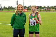 25 September 2021; Kate Brennan from Cong, Mayo, after she won the Girls under-14 Hurdles with Irish sprinter Sarah Quinn during the Aldi Community Games Track and Field Athletics finals at Carlow IT Sports Campus in Carlow. Photo by Matt Browne/Sportsfile