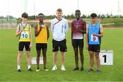 25 September 2021; Irish 100 metre sprinter Marcus Lawler with, from left, Boys 100 metre under-14 medalists fourth place Dan Costello, from Roscommon, third place Promise Jolaoshu, from Clare, first place Philip Finnan, from Castledaly, Westmeath, and second place Lawrence Gevero, from Dublin, during the Aldi Community Games Track and Field Athletics finals at Carlow IT Sports Campus in Carlow. Photo by Matt Browne/Sportsfile