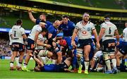 25 September 2021; Leinster players, from left, Ross Molony and Andrew Porter of Leinster celebrate after team-mate James Tracy scored their side's third try during the United Rugby Championship match between Leinster and Vodacom Bulls at Aviva Stadium in Dublin. Photo by Brendan Moran/Sportsfile
