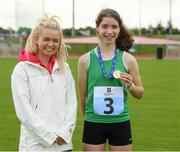25 September 2021; Eanna Ní Haighin, from Crecora-Patrickswell, Limerick, after she won the Girls under-14 100 metres with Irish sprinter Molly Scott during the Aldi Community Games Track and Field Athletics finals at Carlow IT Sports Campus in Carlow. Photo by Matt Browne/Sportsfile