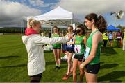 25 September 2021; Eanna Ní Haighin, from Crecora-Patrickswell, Limerick, after she won the Girls under-14 100 metres with Irish sprinter Molly Scott during the Aldi Community Games Track and Field Athletics finals at Carlow IT Sports Campus in Carlow. Photo by Matt Browne/Sportsfile