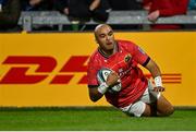 25 September 2021; Simon Zebo of Munster dives over to score his side's first try during the United Rugby Championship match between Munster and Cell C Sharks at Thomond Park in Limerick. Photo by Piaras Ó Mídheach/Sportsfile