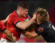 25 September 2021; Jack O’Donoghue of Munster in action against Werner Kok of Cell C Sharks during the United Rugby Championship match between Munster and Cell C Sharks at Thomond Park in Limerick. Photo by Seb Daly/Sportsfile