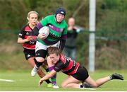 25 September 2021; Aoife O’Sullivan of CYM RFC is tackled by Emma Kelly of Tullamore RFC during the Bank of Ireland Paul Flood plate final match between Tullamore RFC and CYM RFC at Tullow RFC in Carlow. Photo by Michael P Ryan/Sportsfile