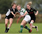 25 September 2021; Emer Meagher of Greystones RFC is tackled by Rachel O Farrell, left, and Amanda Sheridan of Longford RFC during the Bank of Ireland Paul Cusack plate final match between Greystones and Longford at Tullow RFC in Carlow. Photo by Michael P Ryan/Sportsfile
