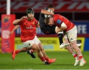 25 September 2021; Curwin Bosch of Cell C Sharks is tackled by Rory Scannell of Munster during the United Rugby Championship match between Munster and Cell C Sharks at Thomond Park in Limerick. Photo by Seb Daly/Sportsfile