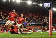 25 September 2021; Simon Zebo of Munster after scoring his side's sixth try, as team-mates Thomas Ahern, left, and Dan Goggin celebrate, during the United Rugby Championship match between Munster and Cell C Sharks at Thomond Park in Limerick. Photo by Seb Daly/Sportsfile