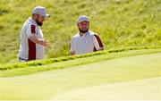 25 September 2021; Shane Lowry, left, and Tyrrell Hatton of Team Europe during their Saturday afternoon fourballs match against Tony Finau and Harris English of Team USA at the Ryder Cup 2021 Matches at Whistling Straits in Kohler, Wisconsin, USA. Photo by Tom Russo/Sportsfile