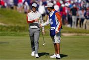 25 September 2021; Rory McIlroy of Team Europe hands his putter to caddie Harry Diamond during his Saturday afternoon fourballs match against Dustin Johnson and Collin Morikawa of Team USA at the Ryder Cup 2021 Matches at Whistling Straits in Kohler, Wisconsin, USA. Photo by Tom Russo/Sportsfile