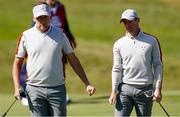 25 September 2021; Ian Poulter, left, and Rory McIlroy of Team Europe during their Saturday afternoon fourballs match against Dustin Johnson and Collin Morikawa of Team USA at the Ryder Cup 2021 Matches at Whistling Straits in Kohler, Wisconsin, USA. Photo by Tom Russo/Sportsfile