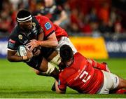 25 September 2021; Phepsi Buthelezi of Cell C Sharks is tackled by Jean Kleyn, behind and Niall Scannell of Munster during the United Rugby Championship match between Munster and Cell C Sharks at Thomond Park in Limerick. Photo by Seb Daly/Sportsfile