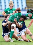 25 September 2021; Linda Djougang of Ireland is tackled by Lana Skeldon of Scotland during the Rugby World Cup 2022 Europe qualifying tournament match between Ireland and Scotland at Stadio Sergio Lanfranchi in Parma, Italy. Photo by Roberto Bregani/Sportsfile