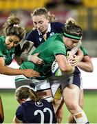 25 September 2021; Ciara Griffin of Ireland is tackled by Sarah Law of Scotland during the Rugby World Cup 2022 Europe qualifying tournament match between Ireland and Scotland at Stadio Sergio Lanfranchi in Parma, Italy. Photo by Roberto Bregani/Sportsfile