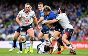 25 September 2021; Andrew Porter of Leinster is tackled by Marcell Coetzee and Mornay Smith of Vodacom Bulls during the United Rugby Championship match between Leinster and Vodacom Bulls at Aviva Stadium in Dublin. Photo by Brendan Moran/Sportsfile