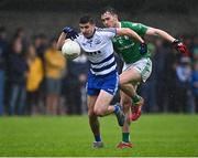 26 September 2021; Daire Morrin of Breaffy in action against Dan Kelly of The Neale during the Mayo Senior Club Football Championship Group 4 match between Breaffy and The Neale at Breaffy GAA Club in Mayo. Photo by Piaras Ó Mídheach/Sportsfile