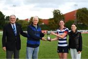 26 September 2021; Blackrock College captain Valerie Power is presented the trophy by Brian Flood, brother of Paul Flood, his daughter Jenny, and President of Leinster Rugby John Walsh after the Bank of Ireland Paul Flood cup final match between Blackrock College RFC J1 and Old Belvedere RFC J1 at Old Belvedere RFC in Anglesea Road, Dublin. Photo by Harry Murphy/Sportsfile