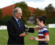 26 September 2021; President of Leinster Rugby John Walsh presents the MVP award to Roisin Crowe of Blackrock College the Bank of Ireland Paul Flood cup final match between Blackrock College RFC J1 and Old Belvedere RFC J1 at Old Belvedere RFC in Anglesea Road, Dublin. Photo by Harry Murphy/Sportsfile