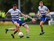 26 September 2021; Michael Hall of Breaffy has his shorts pulled by James Duffy of The Neale during the Mayo Senior Club Football Championship Group 4 match between Breaffy and The Neale at Breaffy GAA Club in Mayo. Photo by Piaras Ó Mídheach/Sportsfile