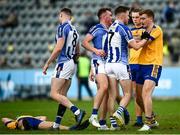 26 September 2021; Robbie McDaid of Ballyboden St Enda's tussles with David Lacey of Na Fianna during the Go Ahead Dublin Senior Club Football Championship Group 1 match between Ballyboden St Endas and Na Fianna at Parnell Park in Dublin. Photo by David Fitzgerald/Sportsfile