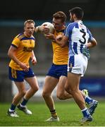 26 September 2021; David Lacey of Na Fianna in action against Shane Clayton of  Ballyboden St Endas during the Go Ahead Dublin Senior Club Football Championship Group 1 match between Ballyboden St Endas and Na Fianna at Parnell Park in Dublin. Photo by David Fitzgerald/Sportsfile