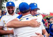 26 September 2021; Ian Poulter of Team Europe is consoled by vice captain Martin Kaymer after winning his Sunday singles match 3&2 against Tony Finau of Team USA at the Ryder Cup 2021 Matches at Whistling Straits in Kohler, Wisconsin, USA. Photo by Tom Russo/Sportsfile