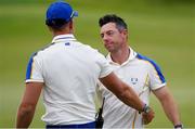 26 September 2021; Rory McIlroy of Team Europe is consoled by vice captain Henrik Stenson after winning his Sunday singles match 3&2 against Xander Schauffele of Team USA at the Ryder Cup 2021 Matches at Whistling Straits in Kohler, Wisconsin, USA. Photo by Tom Russo/Sportsfile