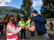25 September 2021; Laya healthcare masks are handed out outside the stadium prior to the United Rugby Championship match between Leinster and Vodacom Bulls at Aviva Stadium in Dublin.  Photo by David Fitzgerald/Sportsfile