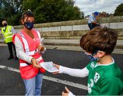25 September 2021; Laya healthcare masks are handed out outside the stadium prior to the United Rugby Championship match between Leinster and Vodacom Bulls at Aviva Stadium in Dublin.  Photo by David Fitzgerald/Sportsfile