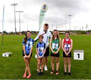 25 September 2021; Irish 100m sprinter Marcus Lawler, with the under-12 100m medalists, from left, Ellie Oldrey and Maebh Tinkler from Dublin, Megan O'Shea from Limerick and Ciara Whelan from Cork during the Aldi Community Games Track and Field Athletics finals at Carlow IT Sports Campus in Carlow. Photo by Matt Browne/Sportsfile