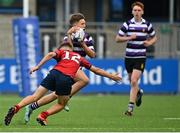 27 September 2021; Paddy Curry of Terenure College in action against Mitchell Grant of CUS during the Bank of Ireland Leinster Schools Junior Cup Round 1 match between CUS and Terenure College at Energia Park in Dublin. Photo by Eóin Noonan/Sportsfile