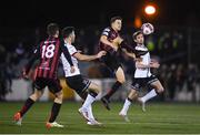 27 September 2021; Keith Buckley of Bohemians controls the ball ahead of Patrick Hoban of Dundalk during the SSE Airtricity League Premier Division match between Dundalk and Bohemians at Oriel Park in Dundalk, Louth. Photo by Ben McShane/Sportsfile