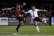 27 September 2021; Patrick Hoban of Dundalk shoots to score his side's second goal despite the attention of Rob Cornwall of Bohemians during the SSE Airtricity League Premier Division match between Dundalk and Bohemians at Oriel Park in Dundalk, Louth. Photo by Ben McShane/Sportsfile