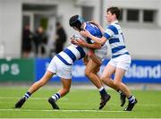 27 September 2021; Anthony Forbes of St Mary's College is tackled by Charlie Woodcock, left, and Conor O’Shaughnessy of Blackrock College during the Bank of Ireland Leinster Schools Junior Cup Round 1 match between St Mary's College and Blackrock College at Energia Park in Dublin. Photo by Daire Brennan/Sportsfile