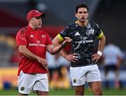 25 September 2021; Munster defence coach JP Ferreira, left, and Joey Carbery during the warm-up before the United Rugby Championship match between Munster and Cell C Sharks at Thomond Park in Limerick. Photo by Piaras Ó Mídheach/Sportsfile
