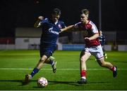 29 September 2021; Stefan Lekovic of Crvena Zvezda in action against Thomas Lonergan of St Patrick's Athletic during the UEFA Youth League First Round First Leg match between St Patrick’s Athletic and Crvena Zvezda at Richmond Park in Dublin. Photo by David Fitzgerald/Sportsfile