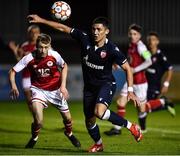 29 September 2021; Marko Lazetic of Crvena Zvezda in action against Reece Webb of St Patrick's Athletic during the UEFA Youth League First Round First Leg match between St Patrick’s Athletic and Crvena Zvezda at Richmond Park in Dublin. Photo by David Fitzgerald/Sportsfile