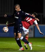 29 September 2021; Aleksander Kahvic of Crvena Zvezda in action against Lule O'Brien of St Patrick's Athletic during the UEFA Youth League First Round First Leg match between St Patrick’s Athletic and Crvena Zvezda at Richmond Park in Dublin. Photo by David Fitzgerald/Sportsfile